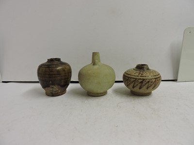 Lot 121 - Three South Asian earthenware jarlets