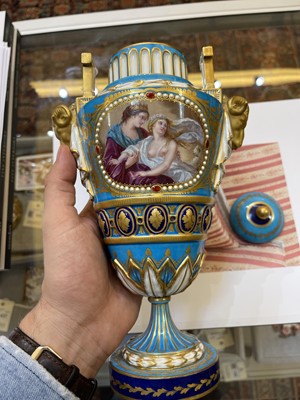 Lot 388 - A pair of Sèvres-style vases and covers