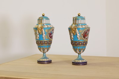 Lot 388 - A pair of Sèvres-style vases and covers