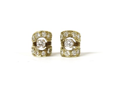 Lot 1186 - A pair of gold diamond stud earrings