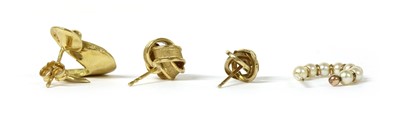 Lot 1404 - Four single gold earrings