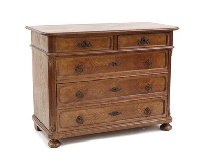 Lot 360 - A 19th century French provincial oak commode chest