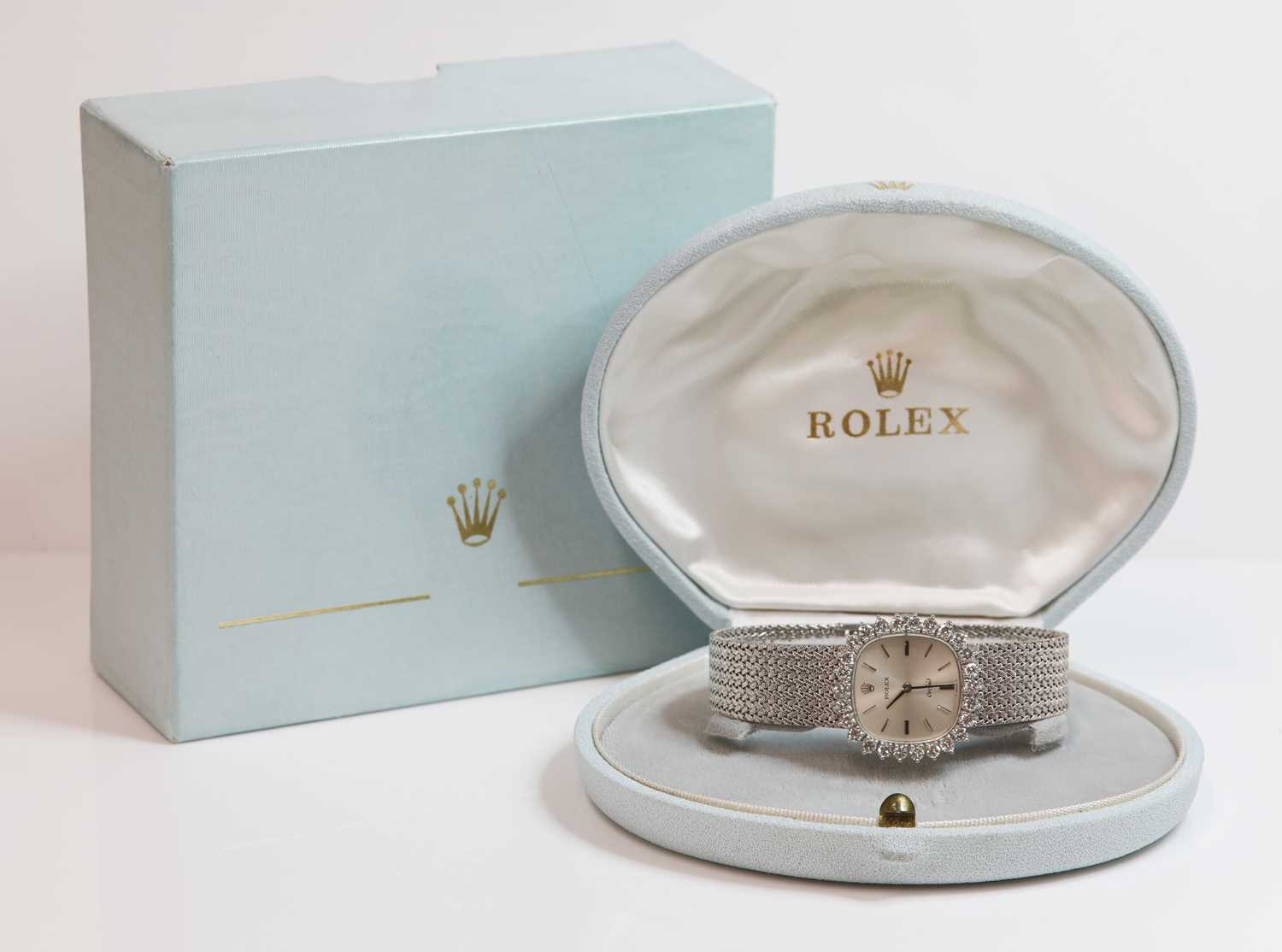 Lot 262 - A ladies' 18ct white gold diamond set Rolex 'Orchid' mechanical bracelet watch