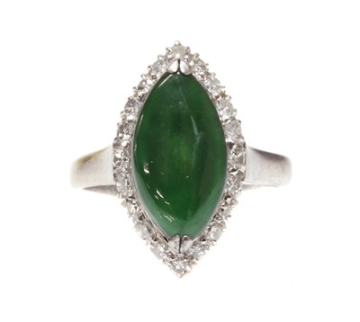 Lot 243 - A nephrite jade and diamond marquise shaped cluster ring