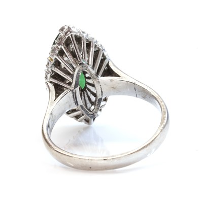 Lot 243 - A nephrite jade and diamond marquise shaped cluster ring