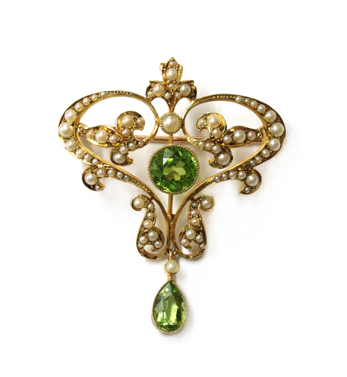 Lot 1037 - An Edwardian gold peridot and split pearl brooch/pendant