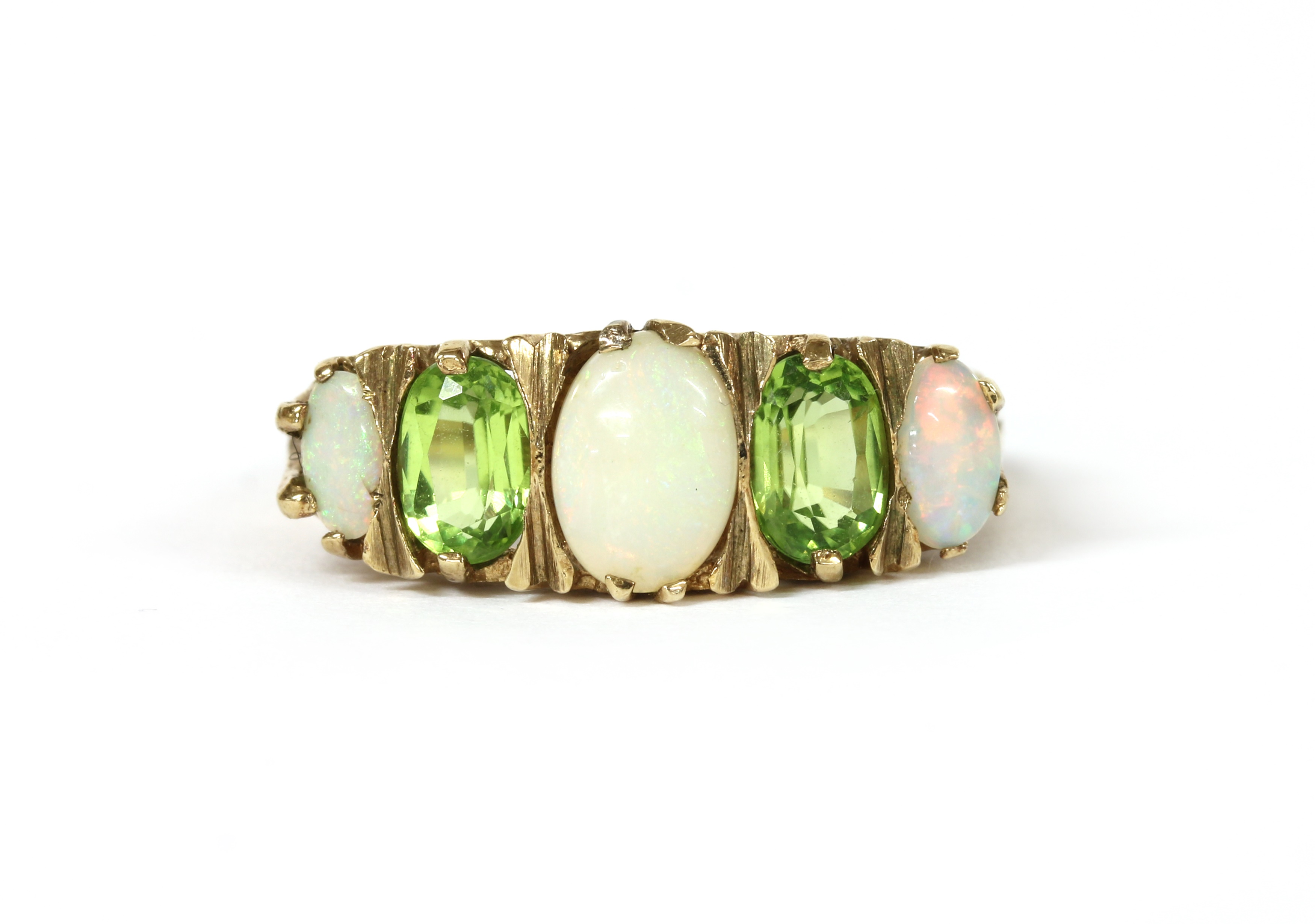 Lot 1262 A 9ct gold opal and peridot ring,