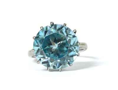 Lot 1295 - A white gold single stone blue zircon ring
