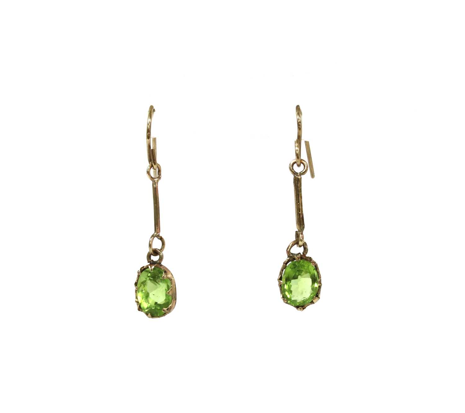 Lot 1260 - A pair of gold peridot drop earrings