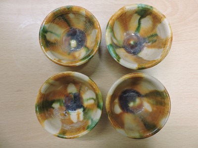 Lot 151 - A Chinese sancai-glazed earthenware box and cover