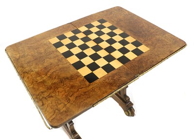 Lot 294 - A Victorian walnut games work table