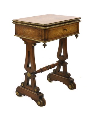 Lot 294 - A Victorian walnut games work table
