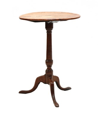 Lot 446 - A George III oak and elm tripod occasional table