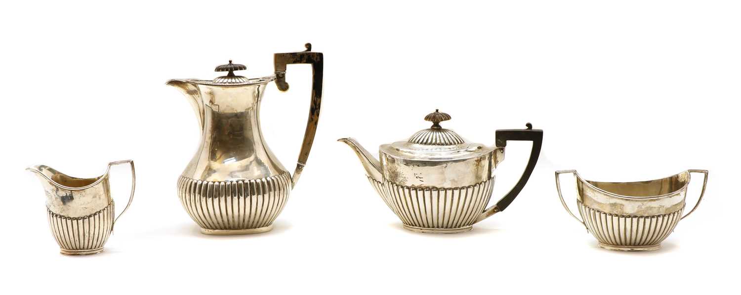 Lot 1 - A composed four-piece silver tea service