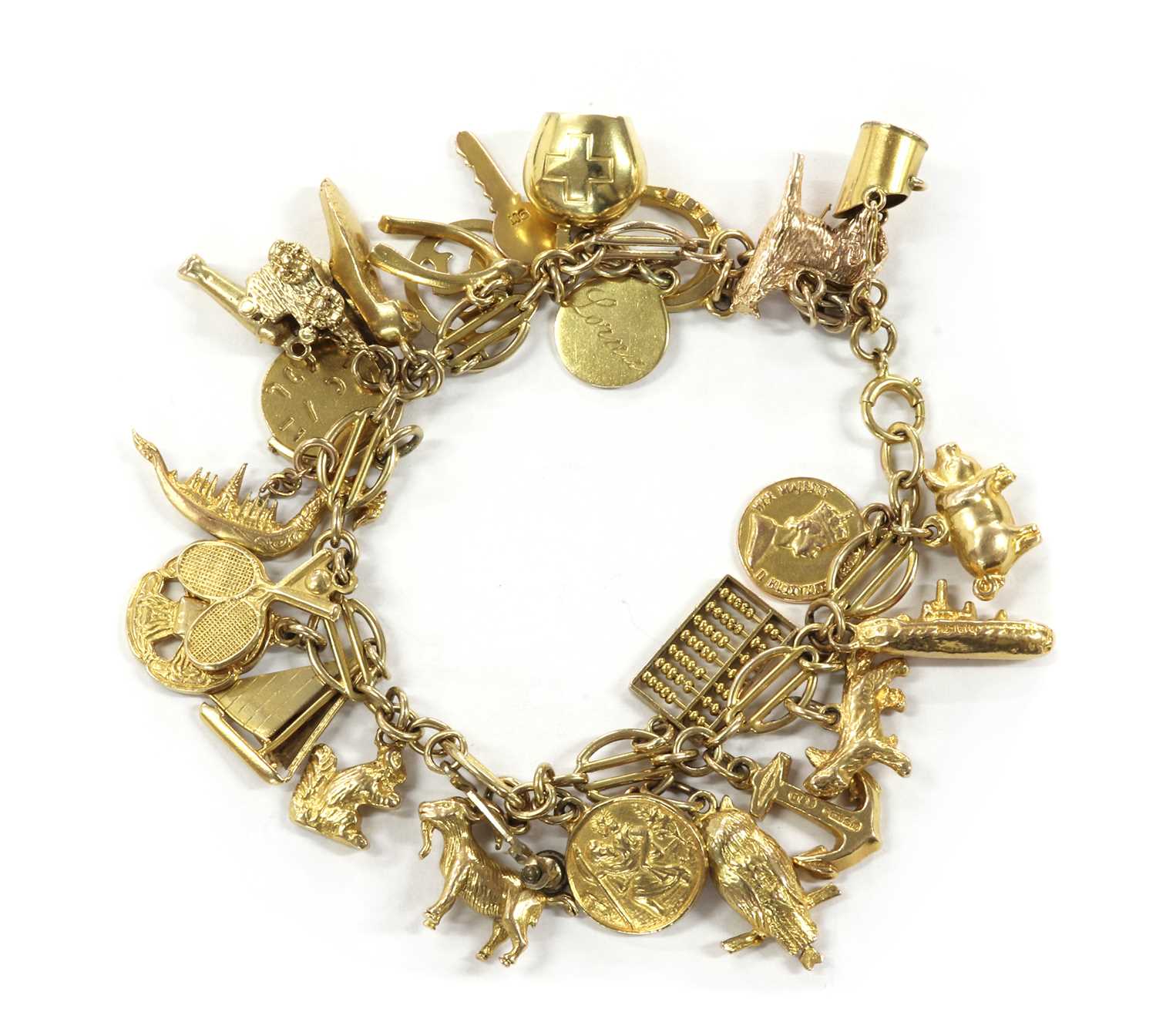 Lot 1098 - A gold charm bracelet