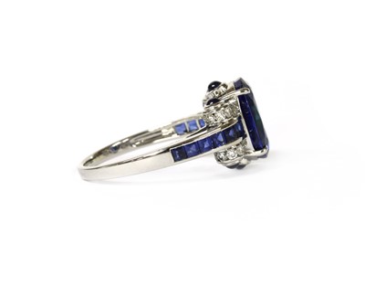 Lot 1282 - A sapphire and diamond ring