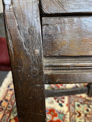 Lot 406 - An oak wainscot armchair