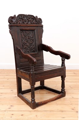 Lot 406 - An oak wainscot armchair
