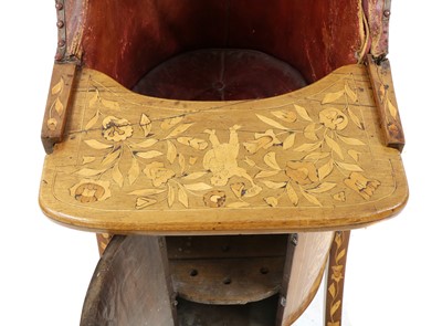 Lot 334 - A marquetry commode chair