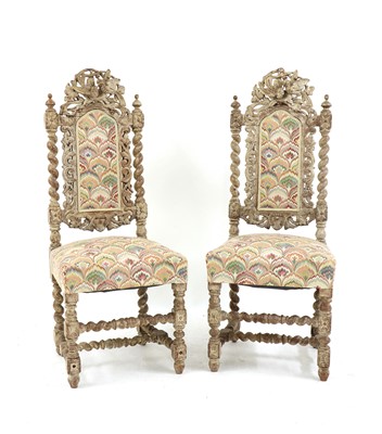 Lot 412 - A pair of Carolean style limed oak side chairs