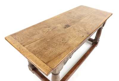 Lot 414 - An oak refectory table