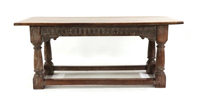 Lot 414 - An oak refectory table