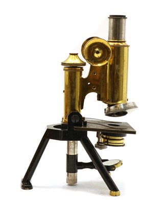 Lot 216 - A mahogany cased brass compound microscope