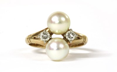 Lot 150 - A gold cultured pearl and diamond ring