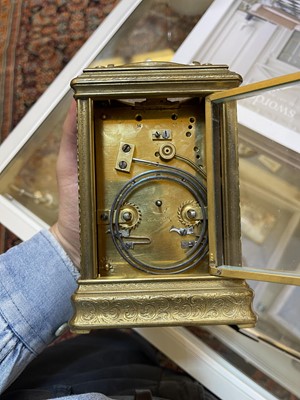 Lot 227 - A French brass and enamel cased carriage clock