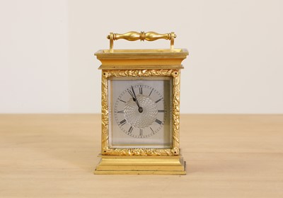 Lot 224 - An English brass carriage clock
