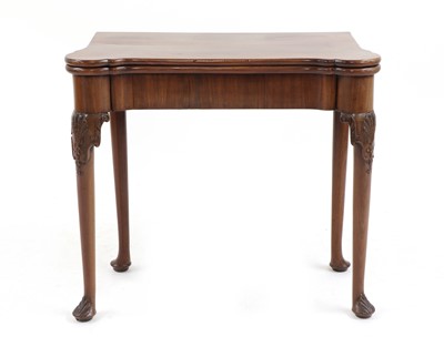 Lot 410 - A George III mahogany foldover tea table