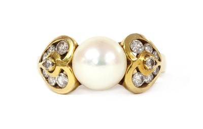 Lot 1310 - A gold cultured pearl and diamond ring