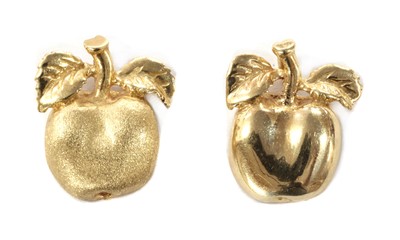 Lot 1129 - A pair of gold apple pendants