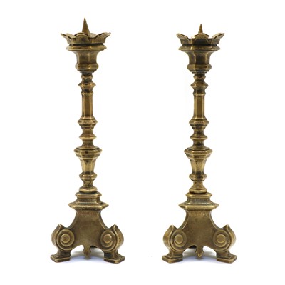 Lot 149 - A pair of Italianate Baroque design brass pricket sticks