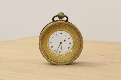 Lot 297 - A French brass drum cased clock
