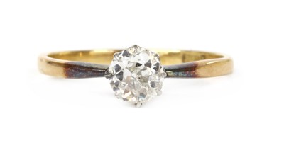 Lot 1167 - A gold single stone diamond ring