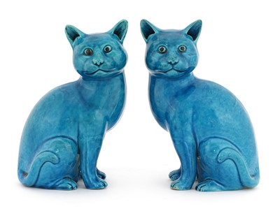 Lot 336 - A pair of Chinese turquoise-glazed porcelain cats