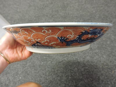 Lot 259 - A Chinese blue and white and iron red plate