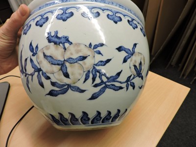 Lot 274 - A Chinese blue, white and copper-red fishbowl