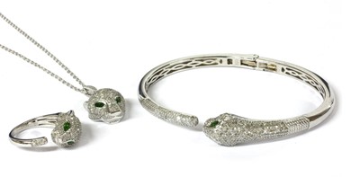 Lot 129 - A silver chrome diopside and diamond set panther bangle, pendant and ring suite