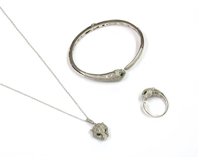 Lot 268 - A silver chrome diopside and diamond set panther bangle, pendant and ring suite