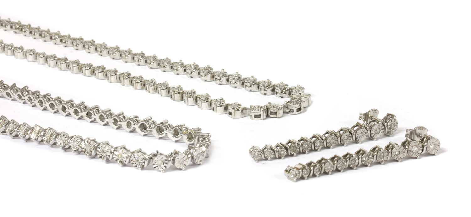 Lot 51 - A silver diamond set necklace, bracelet and earrings suite