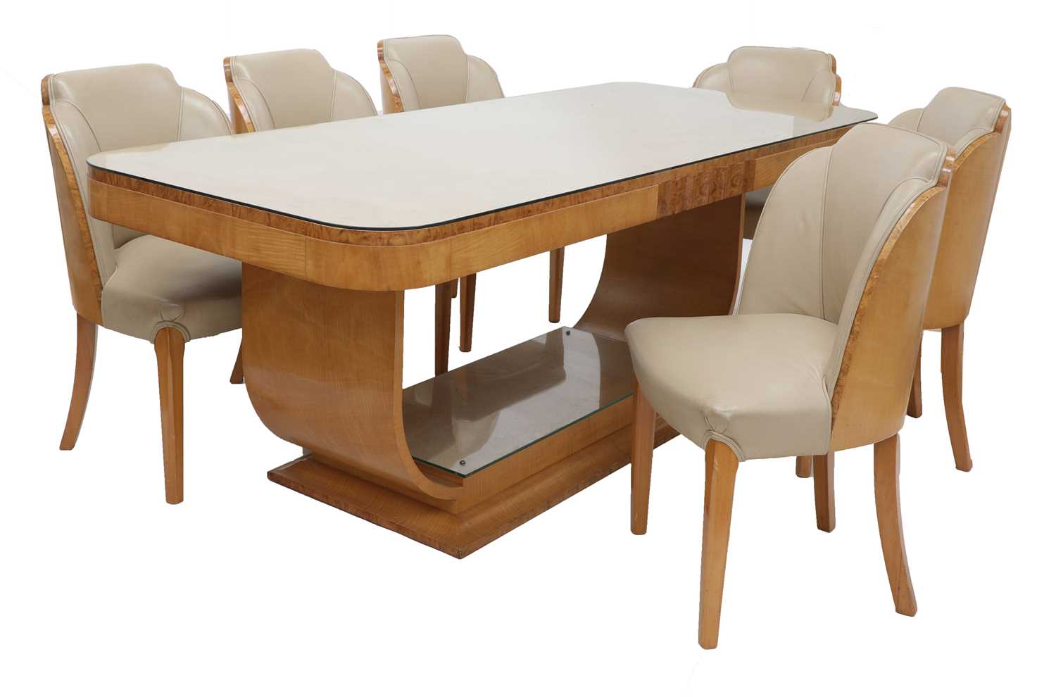 Lot 166 - An Art Deco burr maple dining suite