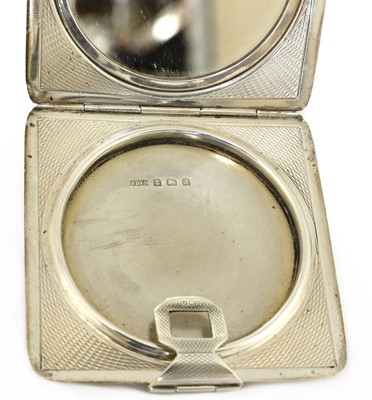 Lot 283 - An Art Deco enamelled silver compact