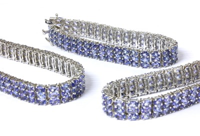 Lot 118 - Three matching sterling silver set tanzanite bracelets