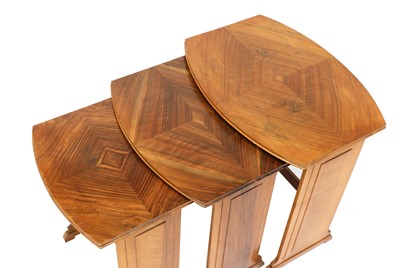 Lot 175 - An Art Deco walnut nest of three tables