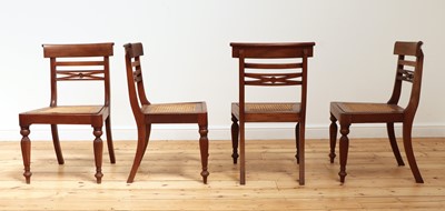 Lot 489 - A matched set of eight Anglo-Indian Regency-style teak dining chairs