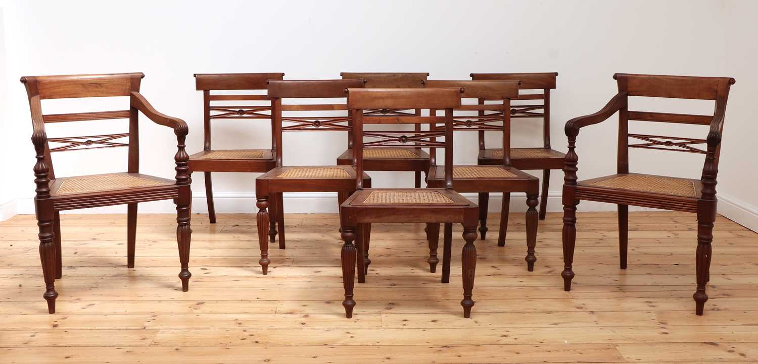 Lot 489 - A matched set of eight Anglo-Indian Regency-style teak dining chairs