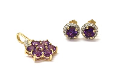 Lot 199 - A 9ct gold amethyst and zircon pendant