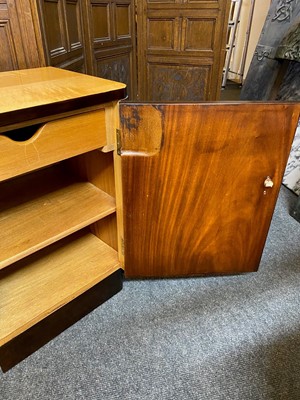 Lot 232 - A pair of Art Deco maple bedside cupboards